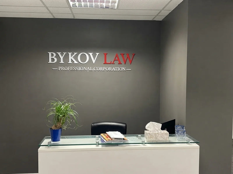Custom 3D law firm reception wall sign for Bykov Law – Melbourne, VIC – Neon Brothers
